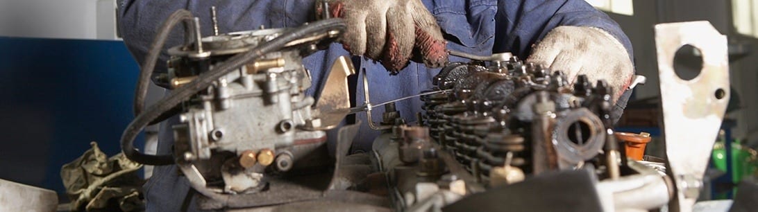 Photo of a automotive mechanic in need of automotive e-commerce solutions. 